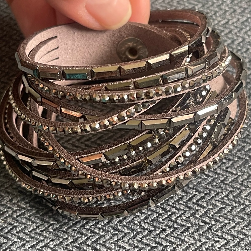 Multi strand double snap bracelet. Faux leather